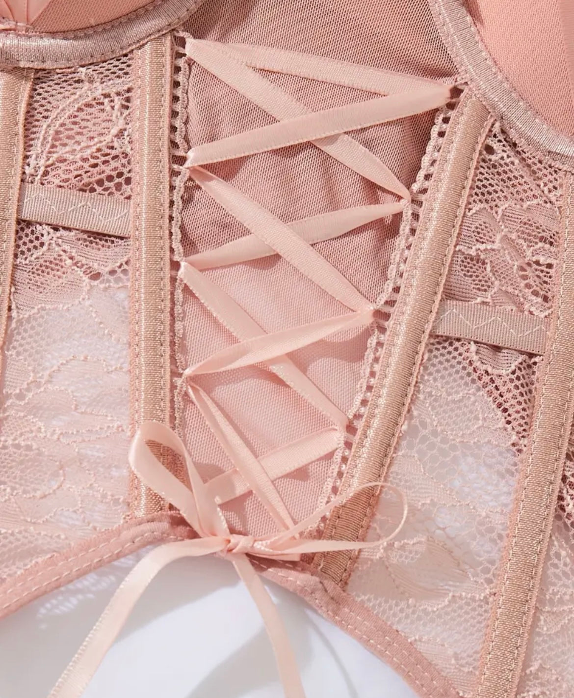 Trimmed bodysuit
